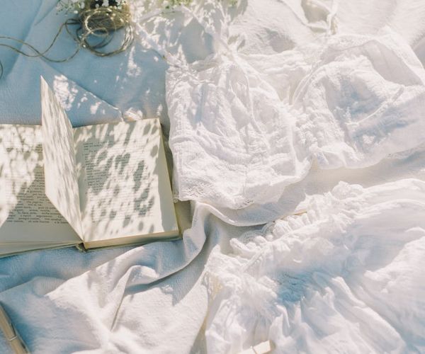 An open book with symbols of tranquility and nature.